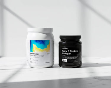 Two supplement containers, one labeled 'EarthFusion' and the other 'Glow & Restore Collagen', on a light background.