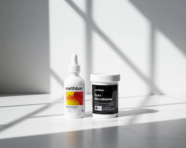 Two earthbar products on a light surface with a white background