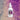 A bottle of 'earthbar Slim Down' herbal tonic with a dropper cap, predominantly white label with purple and pink speckles and text.