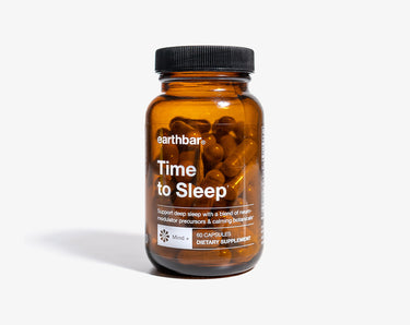 A bottle of 'Time to Sleep' supplements by Earthbar, containing 60 capsules designed for restful sleep.