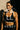 Woman in athletic wear with text overlay on a dark background