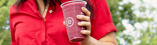 girl holding smoothie