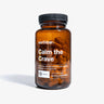 A bottle of 'Calm the Crave' supplement capsules by Earthbar, with a label that includes the product name and the tag 'function tags_weightloss'.