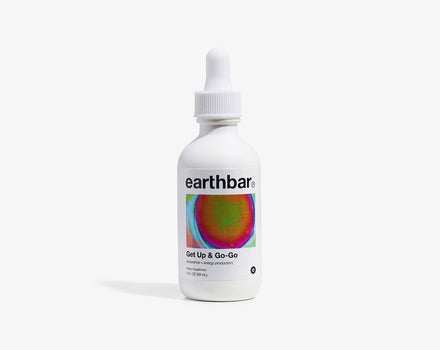 A bottle of Earthbar Get Up & Go-Go herbal tonic with a dropper, against a white background.